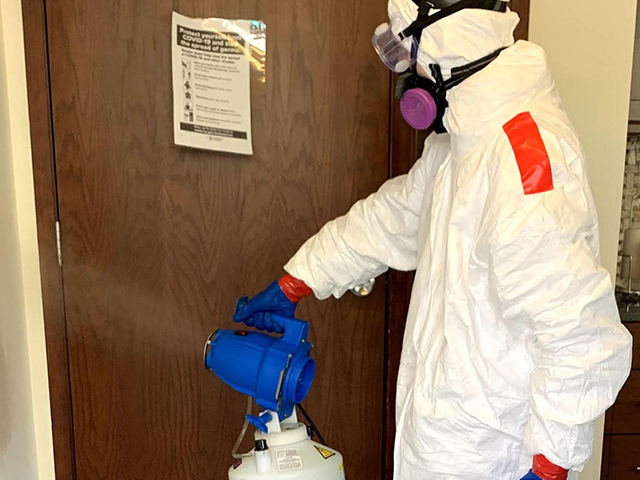 Close spraying of disinfectant